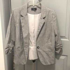 Macy’s. Grey blazer. Lightly used. Size Large.